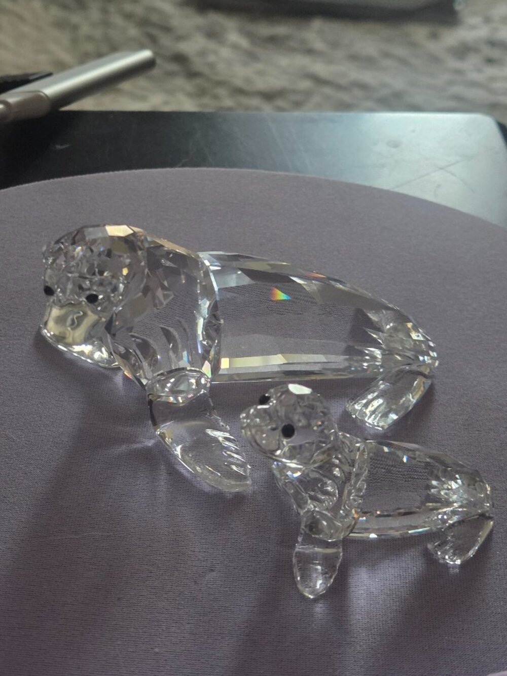 Swarovski Sea Lion mother with Baby features clear crystal facets and black eyes
